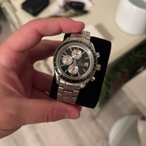 Omega Silver and Black Chronograph Watch